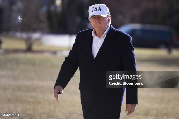 President Donald Trump returns from a weekend trip with Republican leadership to Camp David, on the South Lawn of the White House in Washington,...