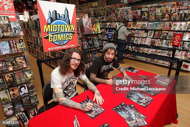 Drummer Andy Hurley and guitarist Joe Trohman of the band Fall Out Boy promote their new comic book, "FOB Presents Fall Out Toy Works" at Midtown...