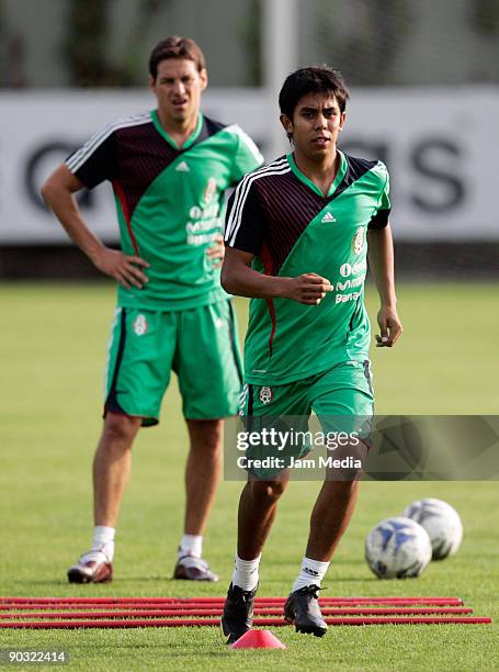 Mexican national soccer team players Guillermo Franco and Nestor Calderon work out during a training session at the Mexican Football Federation's...