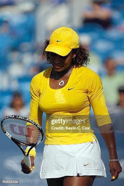 Serena Williams reacts during Day 4 of the Western & Southern Financial Group Women's Open on August 13, 2009 at the Lindner Family Tennis Center in...
