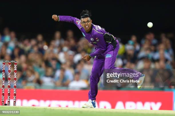 Clive Rose of the Hurricanes bowls during the Big Bash League match between the Brisbane Heat and the Hobart Hurricanes at The Gabba on January 10,...