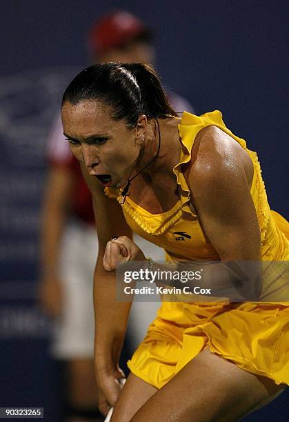 Jelena Jankovic of Serbia reacts after winning a point against Elena Dementieva of Russia during the semifinals of the Western & Southern Financial...