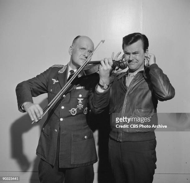 Werner Klemperer as Col. Wilhelm Klink, left, and Bob Crane as Col. Robert E. Hogan in ?Movies Are Your Best Escape?, an episode from the CBS...