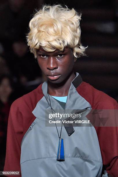 Model walks the runway at the Kiko Kostadinov Fall/Winter 2018/2019 show during London Fashion Week Men's January 2018 at Old Selfridges Hotel on...