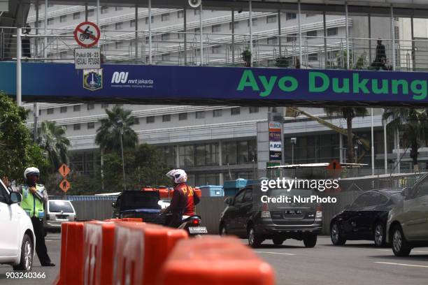 Motorists passing on Mh. Thamrin protocol road, Central Jakarta, on Wednesday, January 10, 2018. Motorcyclists in Jakarta, can re-cross the protocol...