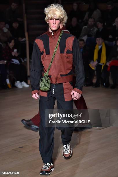 Model walks the runway at the Kiko Kostadinov Fall/Winter 2018/2019 show during London Fashion Week Men's January 2018 at Old Selfridges Hotel on...