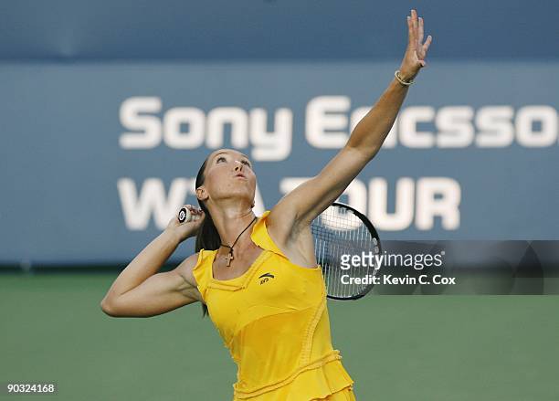 Jelena Jankovic of Serbia serves during Day 5 of the Western & Southern Financial Group Women's Open on August 14, 2009 at the Lindner Family Tennis...