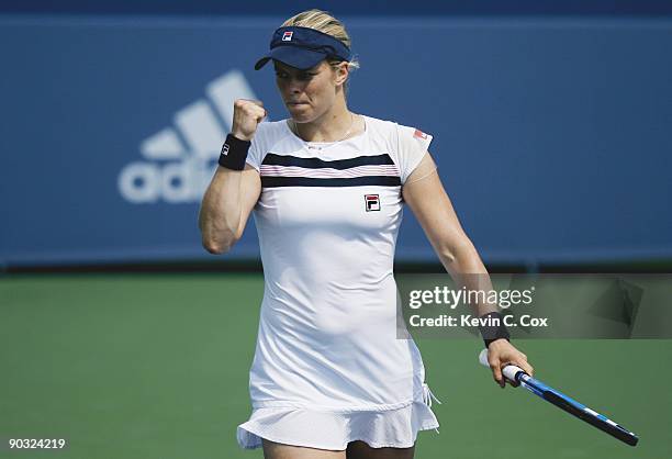 Kim Clijsters of Belgium reacts to play with a fist pump during Day 5 of the Western & Southern Financial Group Women's Open on August 14, 2009 at...