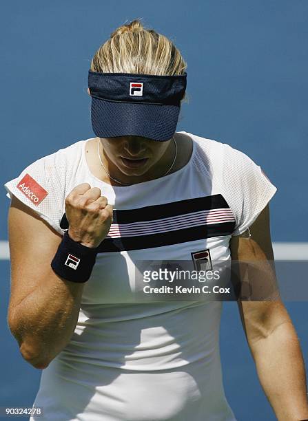Kim Clijsters of Belgium reacts to play with a fist pump during Day 5 of the Western & Southern Financial Group Women's Open on August 14, 2009 at...