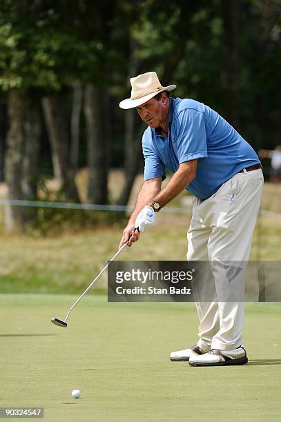 Sports announcer Chris Berman watches his putt at the 13th green during the Deutsche Bank Championship Pro-Am held at TPC Boston on September 3, 2009...