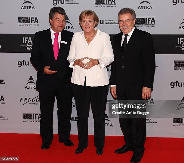 Raimund Hosch, chairman of Messe Berlin, German Chancellor Angela Merkel and Rainer Hecker, chairman of the GFU , attend the IFA Opening Gala at the...