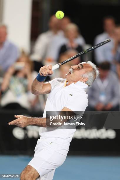 Mark Mansour Bahrami of Iran competes in his match against Robby Ginepri of the USA and Henri Leconte of France on day three of the 2018 World Tennis...