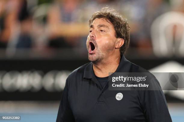 Henri Leconte of France competes in his match against Mark Philippoussis of Australia and Mansour Bahrami of Iranon day three of the 2018 World...