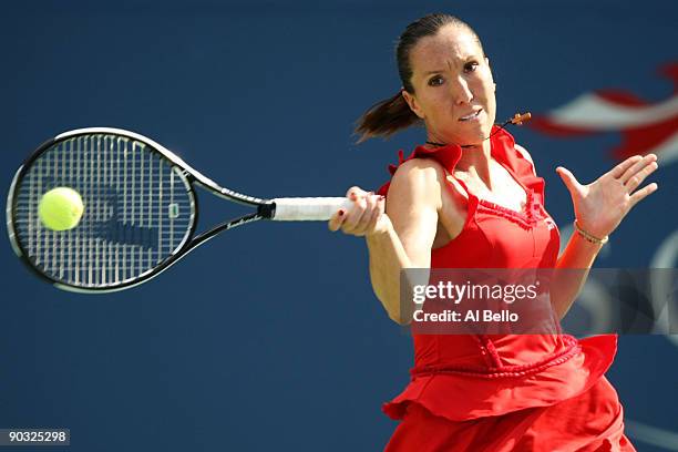 Jelena Jankovic of Serbia returns a shot against Yaroslava Shvedova of Kazakhstan during day four of the 2009 U.S. Open at the USTA Billie Jean King...