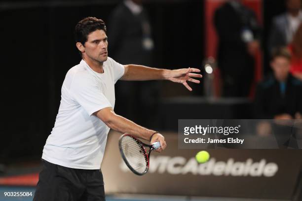 Mark Philippoussis of Australia competes in his match against Robby Ginepri of the USA and Henri Leconte of France on day three of the 2018 World...