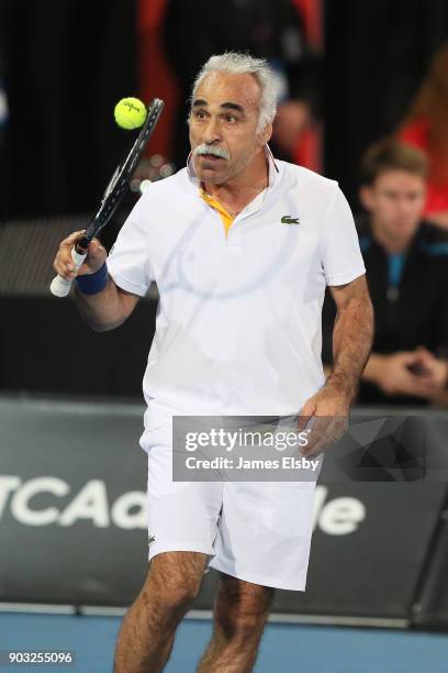 Mansour Bahrami of Iran competes in his match against Robby Ginepri of the USA and Henri Leconte of France on day three of the 2018 World Tennis...