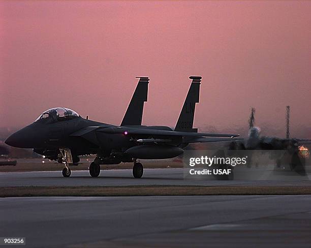 Strike Eagles return from flying a mission against targets in Yugoslavia on March 28, 1999. Members of the 494th Fighter Squadron are deployed to...