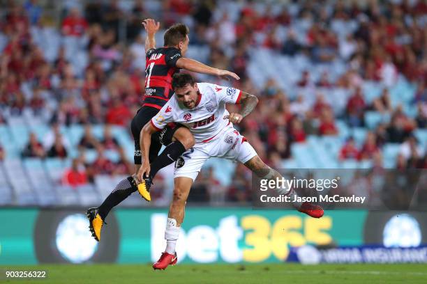 Brendon Santalab of the Wanderers is challenged by Ersan Gulum of Adelaide during the round 15 A-League match between the Western Sydney Wanderers...