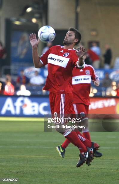 Peter Lowry of the Chicago Fire handles the ball against the Colorado Rapids during the second half at Toyota Park on August 23, 2009 in Bridgeview,...