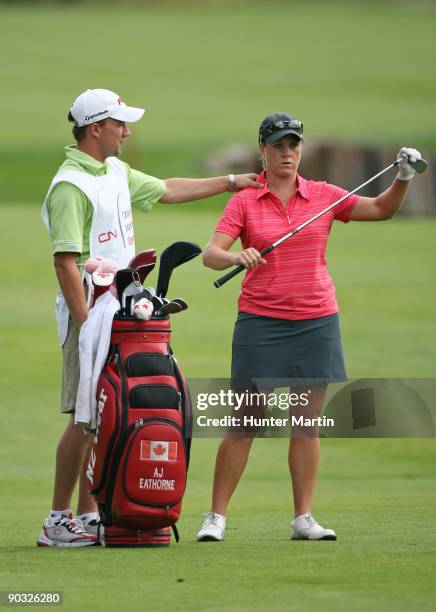 Eathorne gets ready to hit her third shot on the ninth hole during the first round of the Canadian Women's Open at Priddis Greens Golf & Country Club...
