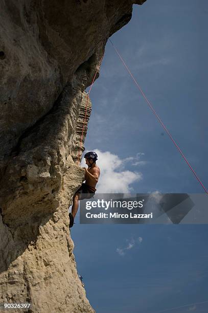 Hector Barbera of Spain and Pepe World Team free-climbs during a ''Visit to the San Marino Republic and the San Patrignano Community'' prior to the...