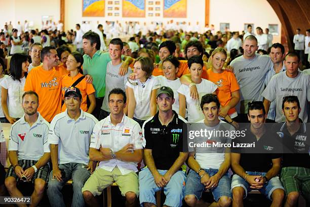 The MotoGP riders pose with denizens of the San Patrignano Community during a ''Visit to the San Marino Republic and the San Patrignano Community''...