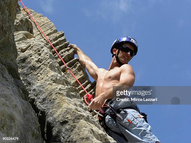 Colin Edwards of the U.S. And Monster Yamaha Tech 3 free-climbs during a ''Visit to the San Marino Republic and the San Patrignano Community'' prior...