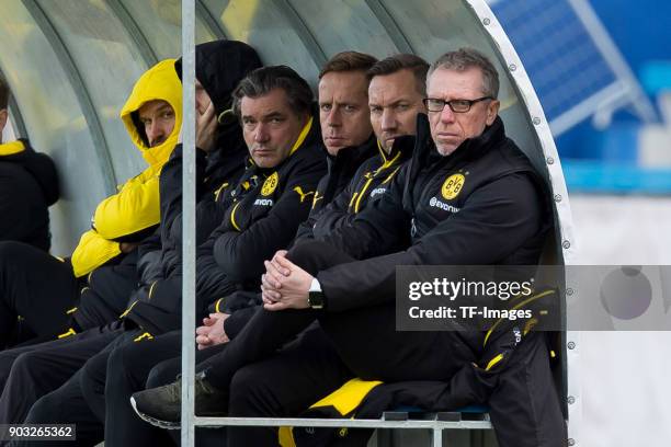 Sporting director Michael Zorc of Dortmund, Assistant coach Joerg Heinrich of Dortmund, Assistant coach Manfred Schmid of Dortmund and Head coach...