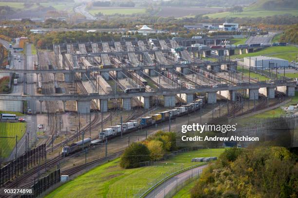 Eurotunnel Shuttle full of artic lorries leaves ther British terminal before entering the Eurotunnel, Cheriton, Folkestone, Kent. United Kingdom. The...