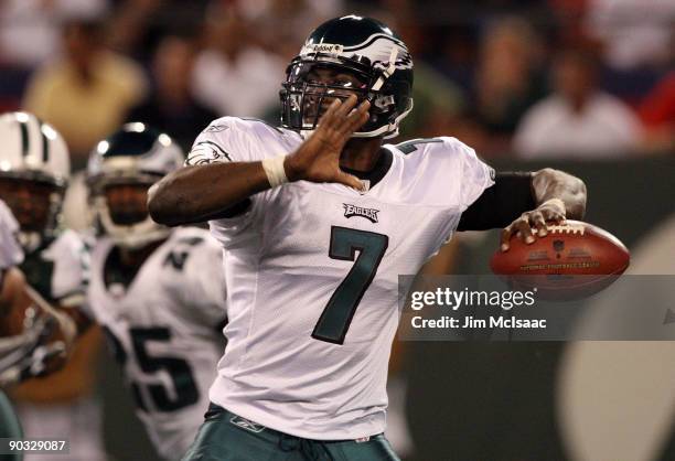 Michael Vick of the Philadelphia Eagles throws a pass against the New York Jets on September 3, 2009 at Giants Stadium in East Rutherford, New...