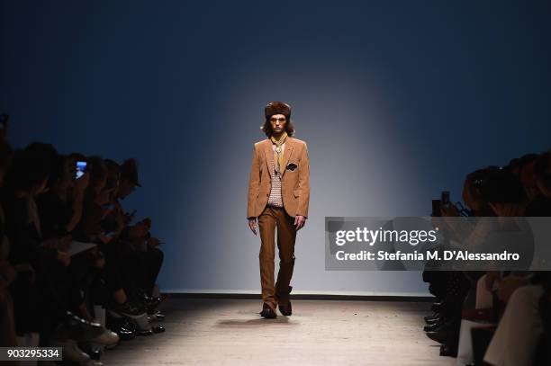 Model walks the runway at the Concept Korea: Beyond Closet e Bmuet show during the 93. Pitti Immagine Uomo at Fortezza Da Basso on January 10, 2018...