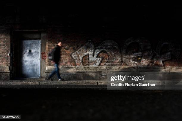 Man walks under a bridge on January 09, 2018 in Berlin, Germany.