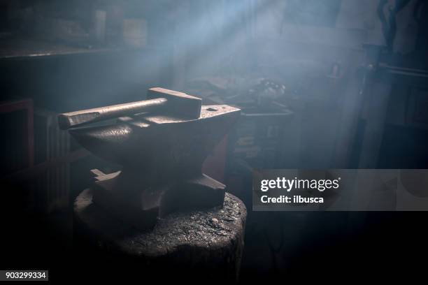 blacksmith artist smithy studio laboratory - serralheiro imagens e fotografias de stock