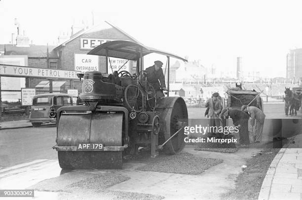 Council workmen seen here repairing a road in Kingston Upon Thames January 1939.