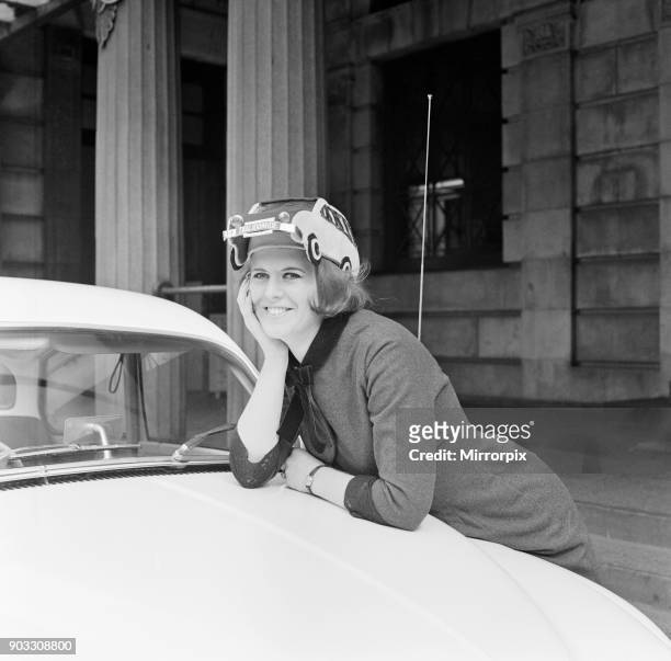 Fee 75 for online and 150 for print Miss Patricia McKenzie of Bagot Street, Liverpool, wears the car hat in aid of thalidomide children. Patricia...
