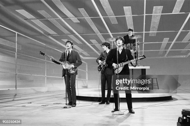 John Lennon Paul McCartney George Harrison and Ringo Starr rehearse their appearance on the Ed Sullivan show. February 1964. .