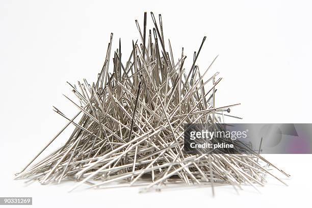 stack of needles - sewing needle stock pictures, royalty-free photos & images