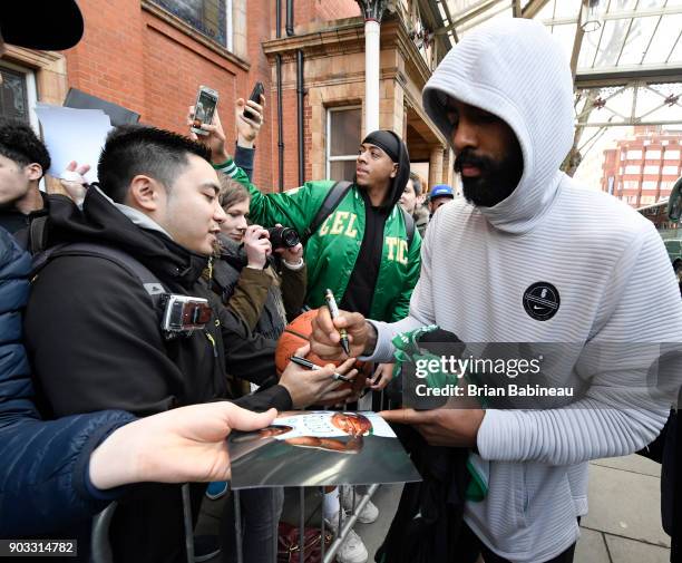 Kyrie Irving of the Boston Celtics signs autographs during practice as part of the 2018 NBA London Global Game at Citysport on January 10, 2018 in...