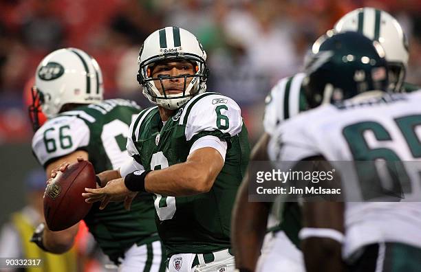 Quarterback Mark Sanchez of the New York Jets looks to make a pass play in the first quarter against the Philadelphia Eagles during the NFL preseason...