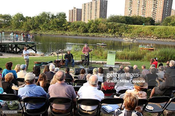 Folk singer-songwriter Pete Seeger and singer Toshi Reagon perform at the 2009 Dorothy and Lillian Gish Prize special outdoor tribute at Hunts Point...