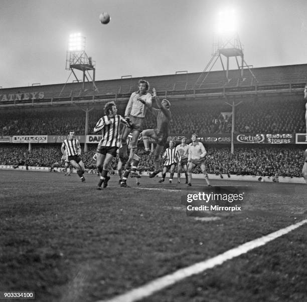 Southampton 2 -5 Manchester United, League Division One match. David Sadler of Manchester United heads clear from Mike Channon with United goalkeeper...