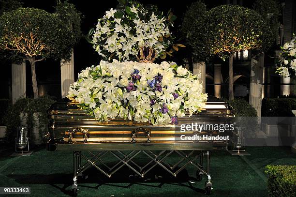 In this handout photo provided by Harrison Funk/The Jackson Family, Michael Jackson's casket rests during the funeral service held at Glendale Forest...