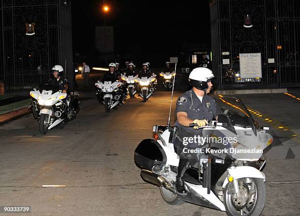 The Glendale Police Department motorcycle motorcade is lined up infront of the cemetery for departures following Michael Jackson's funeral service...