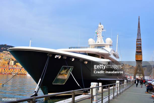 luxurious yacht moored - anlegetau stock-fotos und bilder