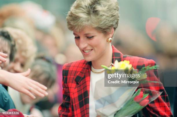 The Princess of Wales, Princess Diana, dressed in tartan, on a walkabout in Manchester where she visited the Manchester Art Gallery in Moseley...