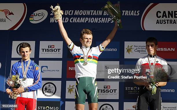 Burry Stander of South Africa celebrates after beating Alexis Vuillermoz of France and Thomas Litscher of Switzerland in the mens U23 Cross Country...