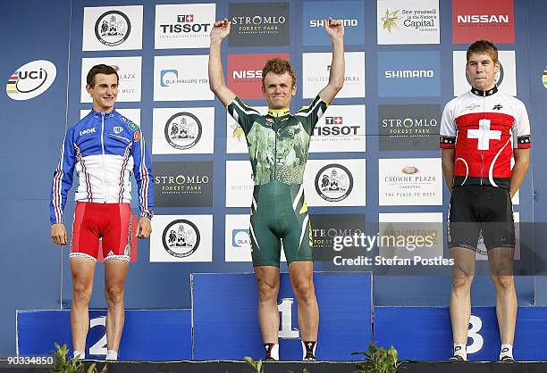 Burry Stander of South Africa celebrates after beating Alexis Vuillermoz of France and Thomas Litscher of Switzerland in the men's U23 Cross Country...