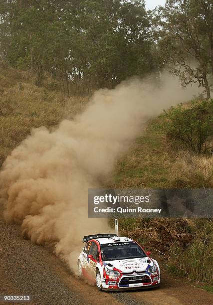 Sebastien Ogier of France and Julien Ingrassia of France compete in their Citroen C4 Total during the Repco Rally of Australia Special Stage Four on...