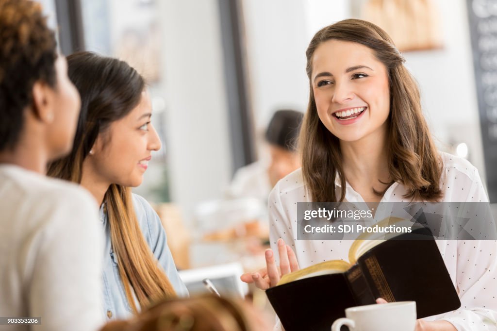 Friends studying the Bible together