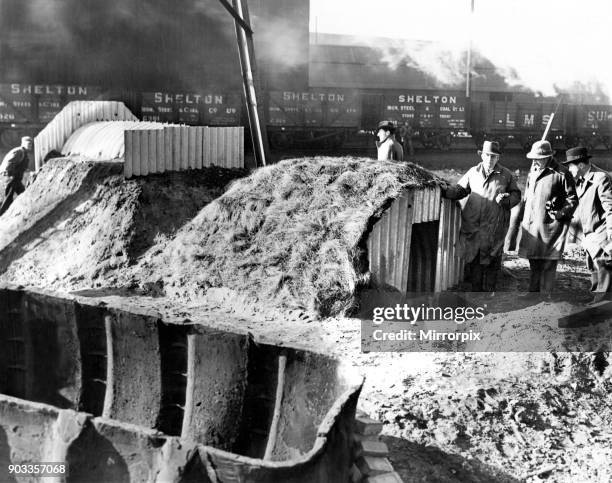 Viewing the two Home Office steel shelters which are being made by John Summers and Sons of Shotton. Mr Geoffrey Summers and Mr J T Kirk, Home Office...